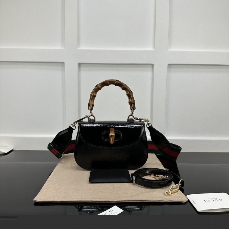 G*u*i top handle bags